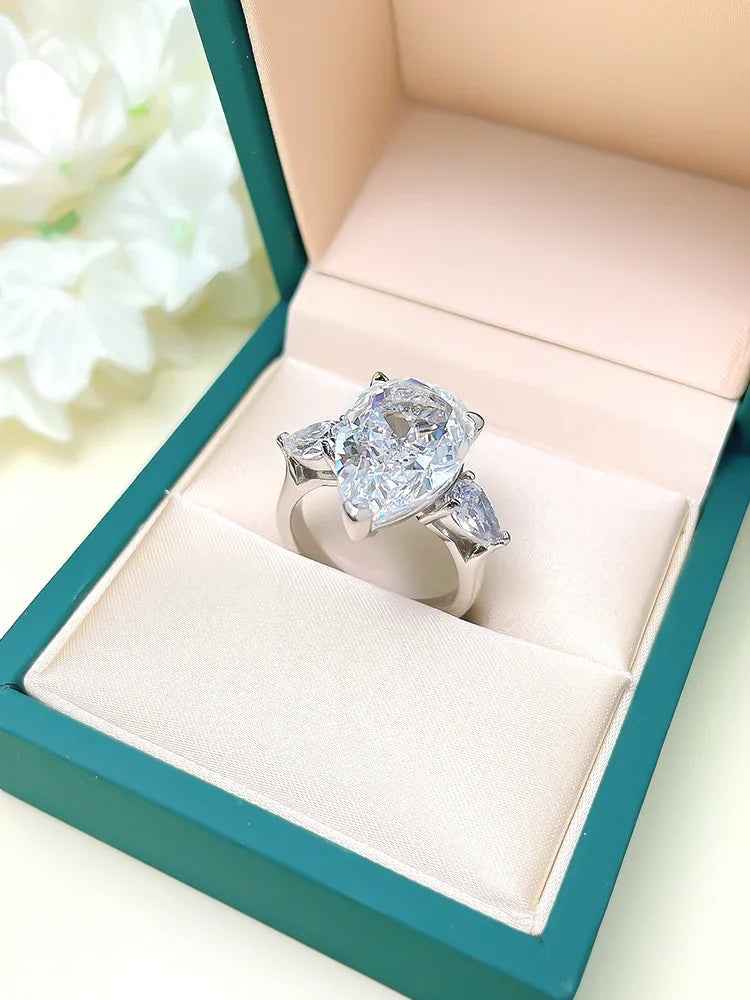 925 sterling silver European and American classic three stone water droplet ring inlaid with imported high carbon diamond