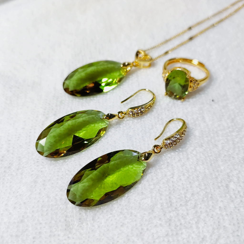 BOCARMAN Synthetic Zultanite Color Changing Pendant Necklace for Women Elongated Oval Cut Gemstone Light Sensitive Statement